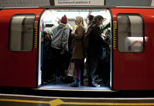Hours Prints: Crowded London Underground carriage during morning rush hour