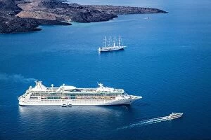 Images Dated 17th May 2019: Cruise ships at sea. Santorini bay, morning sunlight, sailboat, yacht. Volcano deep sea