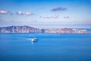 Images Dated 17th May 2019: Cruise ships at sea. Santorini bay, morning sunlight, sailboat, yacht. Volcano deep sea