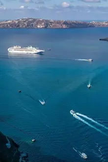 Cruise ships in Thira on Santorini island, Greece. Beautiful landscape with sea view. Cruise ships at the sea near the islands. Santorini island
