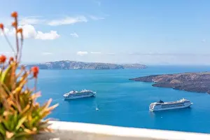 Cruise ships in Thira on Santorini island, Greece. Beautiful landscape with sea view. Cruise ships at the sea near the islands. Santorini island