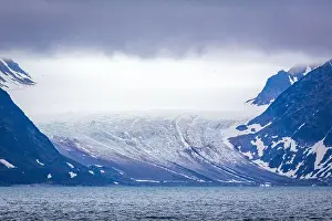 Grey Clouds Prints: cruising in the Arctic in the Isfjorden on Svalbard, Norway