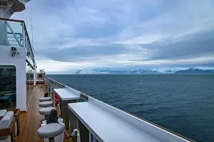 Grey Clouds Prints: cruising in the Arctic in the Isfjorden on Svalbard, Norway