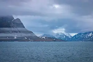 Grey Clouds Prints: cruising in the Arctic in the Isfjorden on Svalbard, Norway