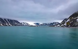 Grey Clouds Prints: cruising in the Arctic in the Magdalensfjorden on Svalbard, Norway