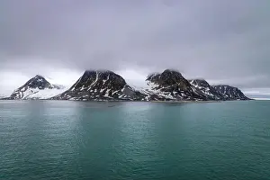 Grey Clouds Prints: cruising in the Arctic in the Magdalensfjorden on Svalbard, Norway