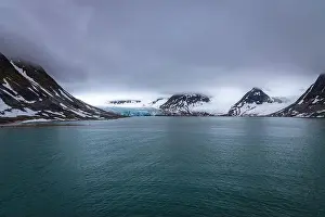 Grey Clouds Prints: cruising in the Arctic in the Magdalensfjorden on Svalbard, Norway