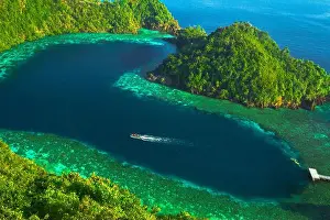 Heart Shape Prints: Cruising on the heart-shaped lagoon on Karawapop Island, Misool Raja Ampat