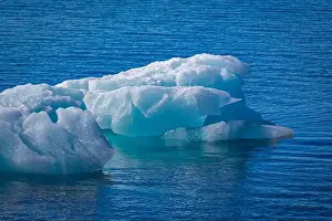 cruising on Svalbard between Spitsbergen and Nordaustlandet anlong with some small icebergs