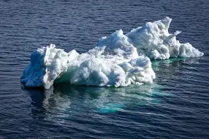 cruising on Svalbard between Spitsbergen and Nordaustlandet anlong with some small icebergs