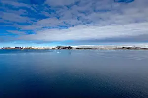 White Glacier Prints: cruising through the wonderful Arctic along glacier between Nordaustlandet and Spitsbergen