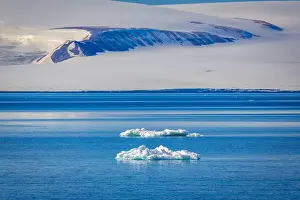 White Clouds Prints: cruising through the wonderful Arctic along glacier between Nordaustlandet and Spitsbergen