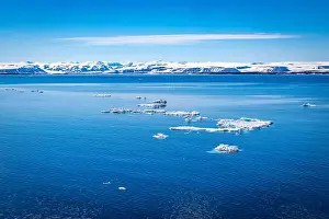 White Clouds Prints: cruising through the wonderful Arctic along glacier between Nordaustlandet and Spitsbergen