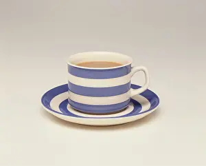 Matching Prints: Cup and saucer filled with tea