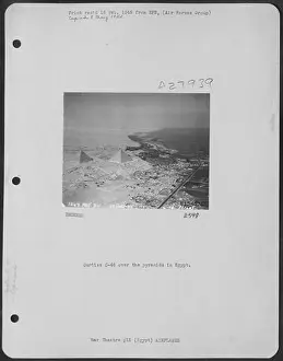 Pyramids Prints: Curtiss C-46 over the pyramids in Egypt