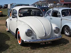 A customised white Volkswagen Beatle