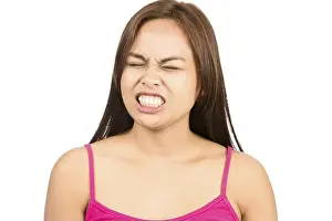 Communicating Prints: A cute angry Asian woman, eyes closed