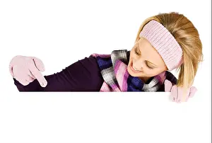 Behind Prints: Cute Caucasian woman in winter clothing in various poses with white card