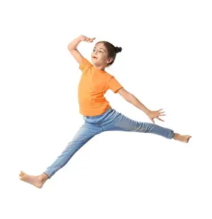 Primary School Prints: Cute little girl jumping on white background