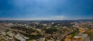 Dalat or Da Lat, Vietnam aerial panorama of agricultural area showing farms and greenhouses