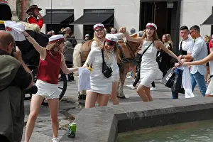 Entertaining Prints: Danish high school students celebrate their graduation by the traditional dance round the Stork Fountain