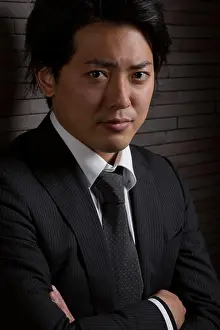 Necktie Prints: Dark and Serious Asian Male Portrait