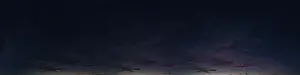 Dark blue sky panorama after sunset with Cirrus clouds