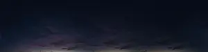 Dark blue sky panorama after sunset with Cirrus clouds