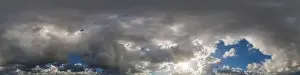 Dark blue sunset sky panorama with Cumulus clouds