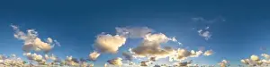 Dark blue sunset sky panorama with Cumulus clouds