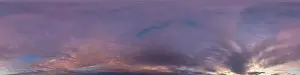 Dark blue sunset sky panorama with pink Cumulus clouds