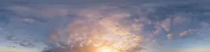 Dark blue sunset sky panorama with pink Cumulus clouds