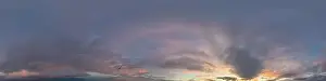 Dark blue sunset sky panorama with pink Cumulus clouds
