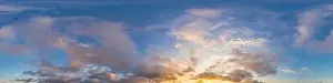 Dark blue sunset sky panorama with pink Cumulus clouds