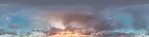 Dark blue sunset sky panorama with pink Cumulus clouds