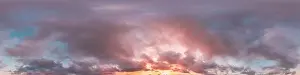 Dark blue sunset sky panorama with pink Cumulus clouds