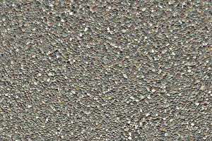 Specialized Prints: Dark concrete surface with an oyster shell aggregate