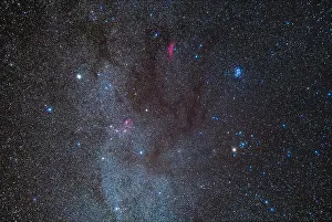 The dark lanes of interstellar dust in Taurus known as the Taurus Dark Clouds, here in an image framing Taurus and Auriga, with some stars of Perseus
