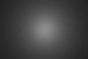 Alloy Prints: Dark metal surface with halo lighting for use as a background design element
