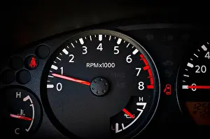 Dial Prints: Dashboard of a car showing tachometer