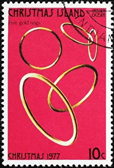 Twelve days of Christmas - 5 gold rings on postage stamp of Christmas Island