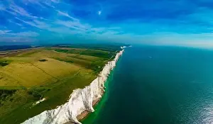 A daytime aerial drone view of the Seven Sisters cliffs on the East Sussex coast, UK