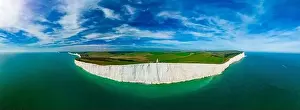 A daytime aerial drone view of the Seven Sisters cliffs on the East Sussex coast, UK