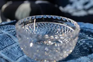 Defocused Prints: Defocused macro abstract texture background view of a small lead crystal bowl surface with diamond facet cuts