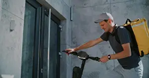 Online Shopping Prints: Delivery Man on Electric Scooter Brining Paper Bag with Online Shopping Order for Businesswoman Working in Office