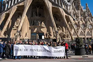 Sagrada Prints: Demonstrators seen with a huge banner in front of the main door of the temple during the protest