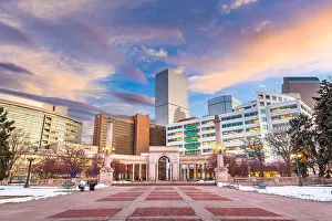 Denver, Colorado, USA downtown cityscape in Civic Center park at duskl