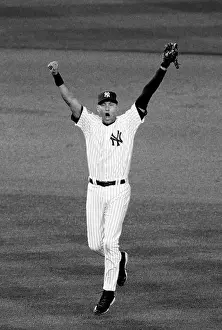 2009 Prints: Derek Jeter #2 of the New York Yankees celebrates 2009 MLB World Series at Yankee Stadium on November 4