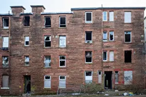 Derelict and burnt out facade of Scottish Tenement building in Clune Park