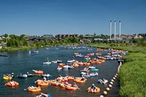 Rental Prints: A Deschutes river float is a popular summer activity in the Old Mill District of Bend
